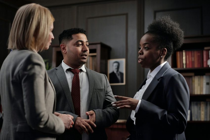 Government officials talking to one another